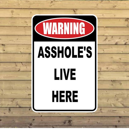 Waring A**holes Live Here Metal Novelty Sign